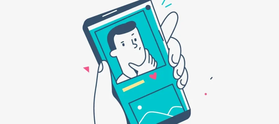 susam A cartoon hand holds a smartphone showing an illustrated man with a puzzled expression, one hand on his chin. The phone’s screen has teal and yellow accents and simple graphics, suggesting a video call or social media app.